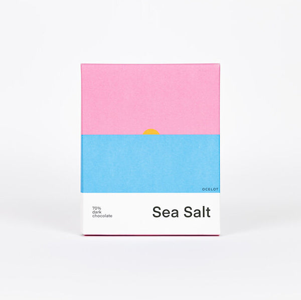 Image of packaging of sea salt chocolate. Includes a abstract illustration of a sunset.