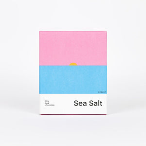 Image of packaging of sea salt chocolate. Includes a abstract illustration of a sunset.