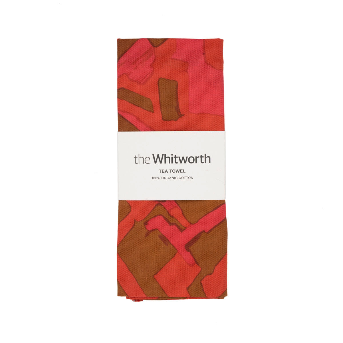 Red tea towel folded with a white Whitworth belly band.
