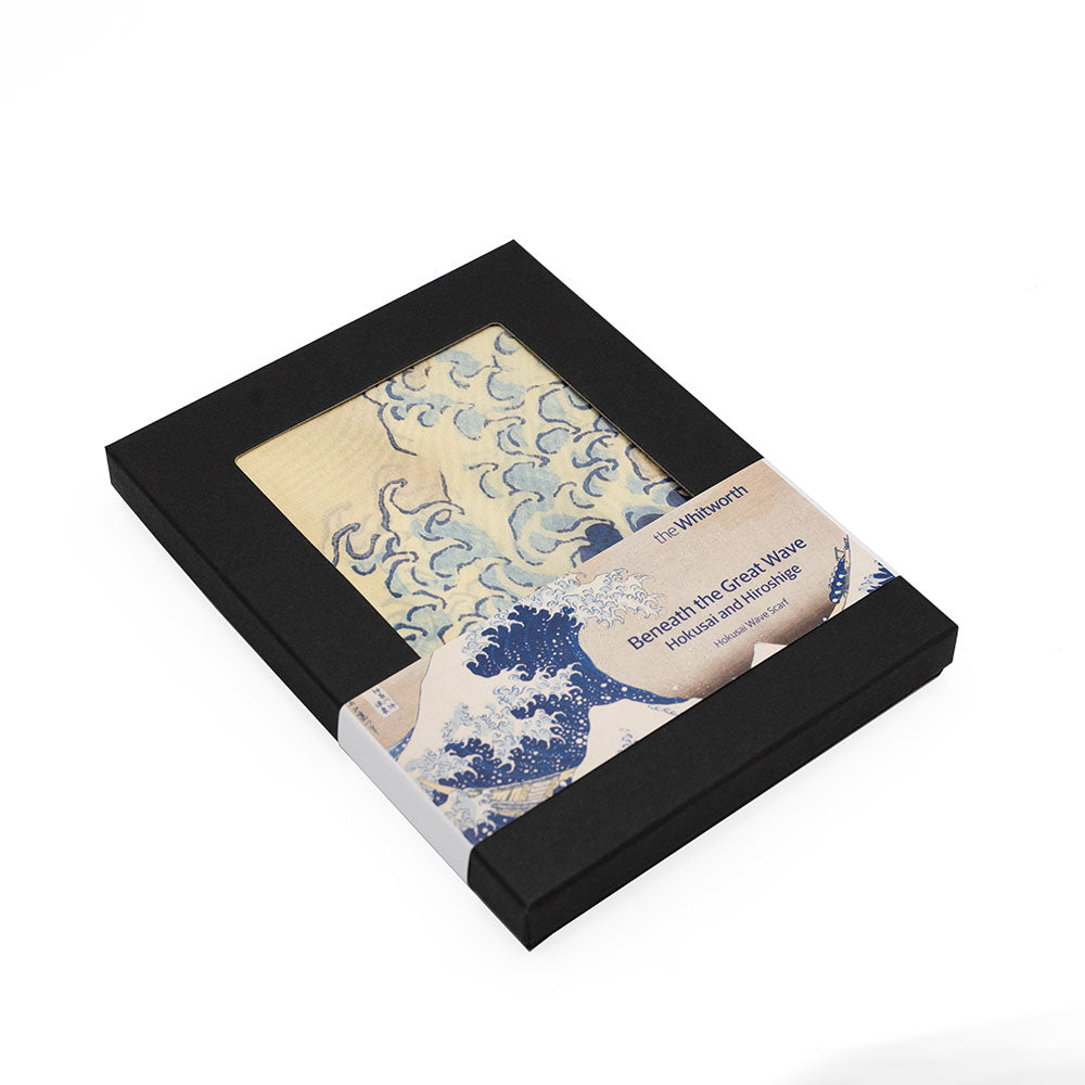 Box with artistic design and text on a white background