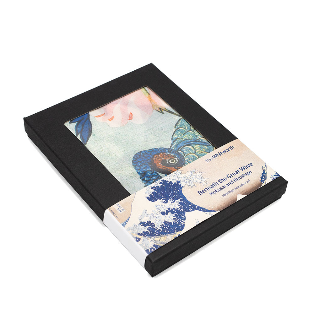 Packaged product with artistic design and text on a white background