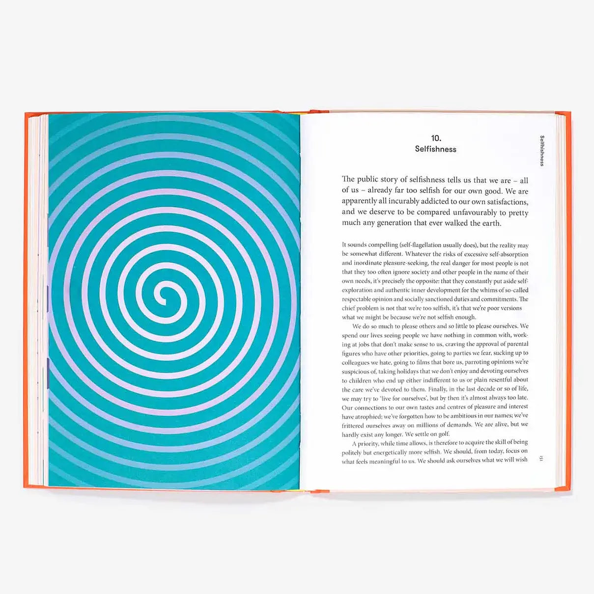 Open book with a blue spiral design on one page and text on the other, on a white background.