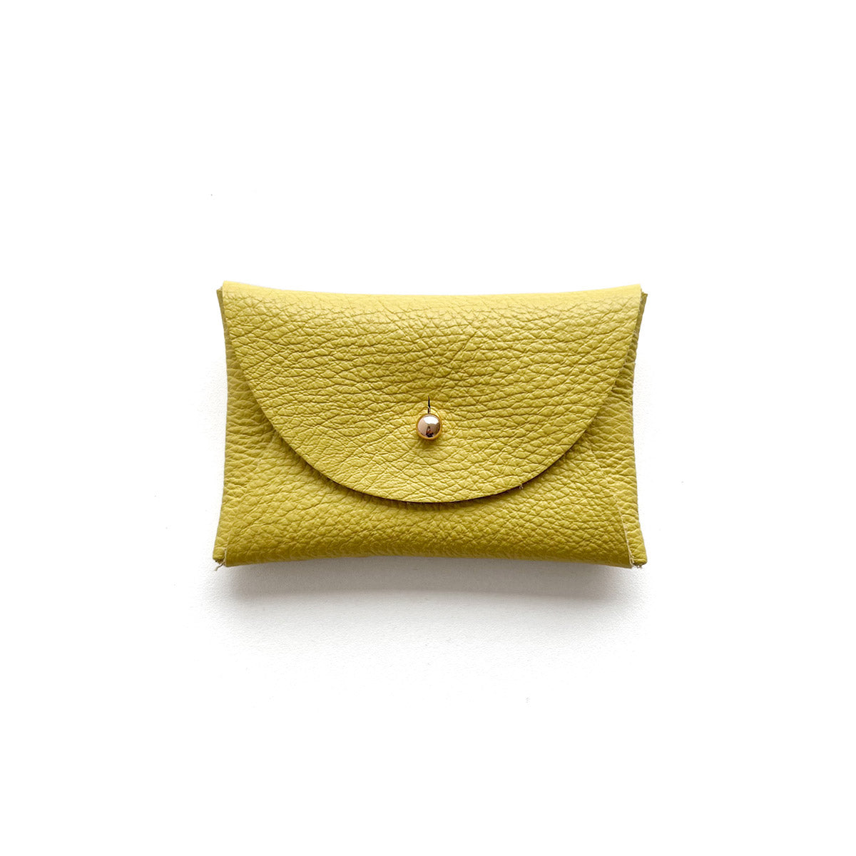 Rectangular yellow leather purse with silver button, presented on a white background