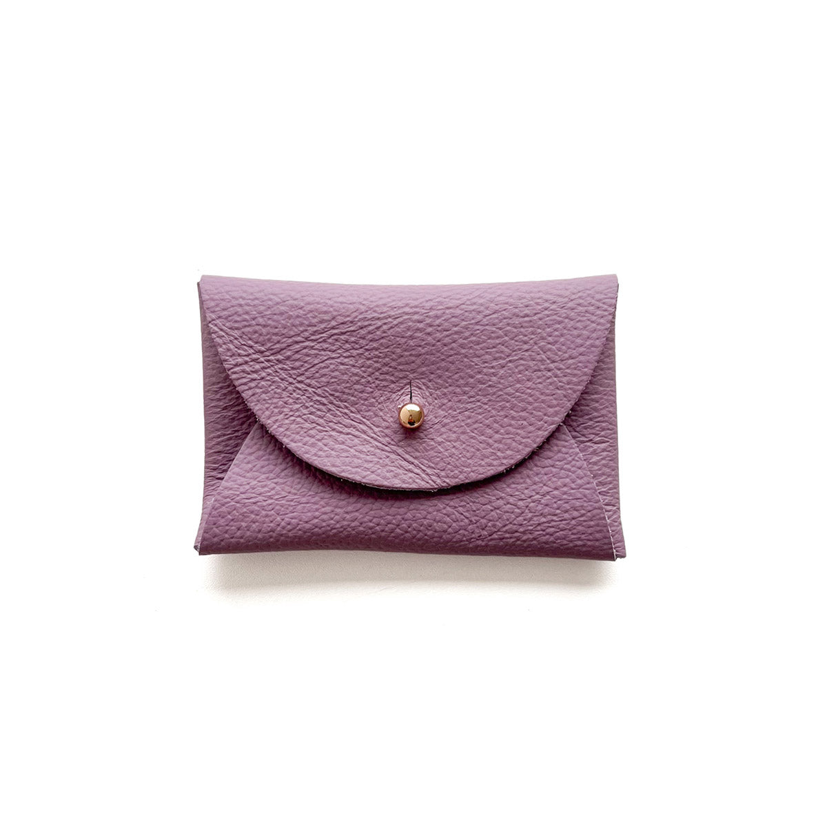 Rectangular lilac leather purse with silver button, presented on a white background.