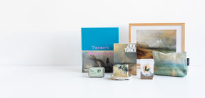 A series of products related to JMW Turner presented in front of a white background. These include a cosmetics bag, a print, and books.