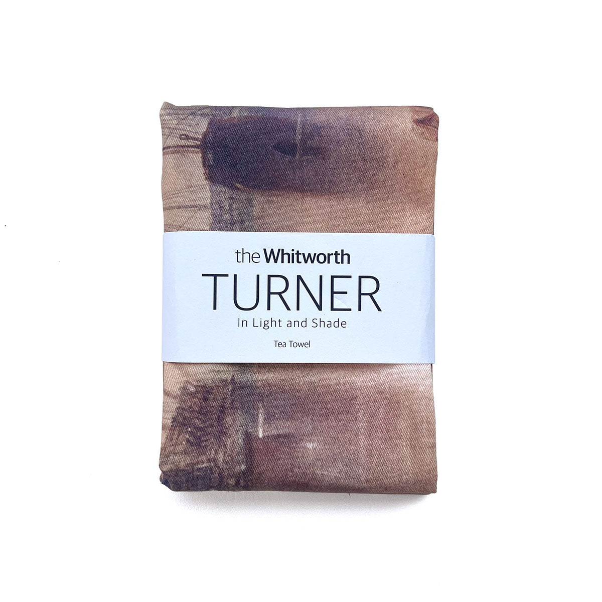 Tea towel with 'the Whitworth Turner' label on a white background
