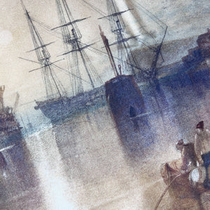 Close up of the tea towel featuring detail of ships and a boat