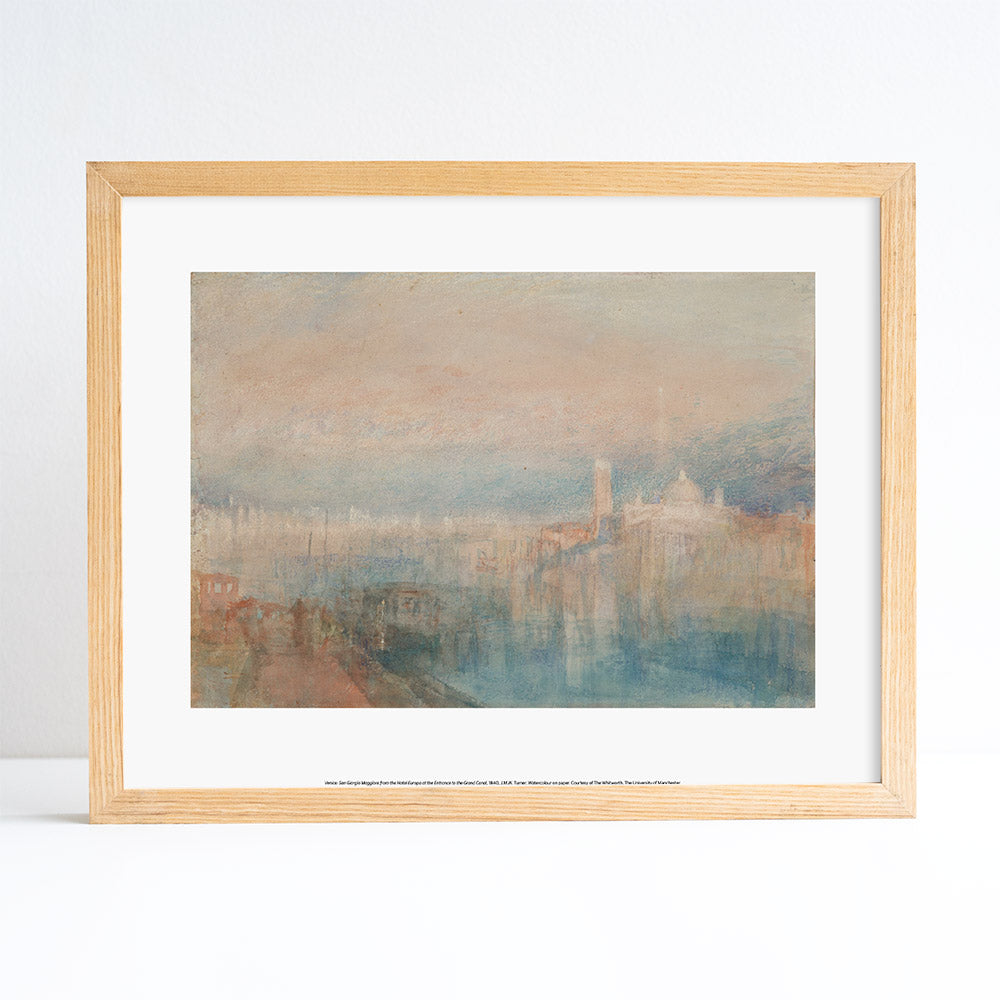 Framed artwork of a cityscape with a wooden frame on a white background