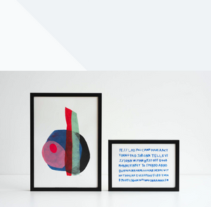Image of two Venture Arts prints in black frames. Left is an abstract piece and right is a piece with writing.