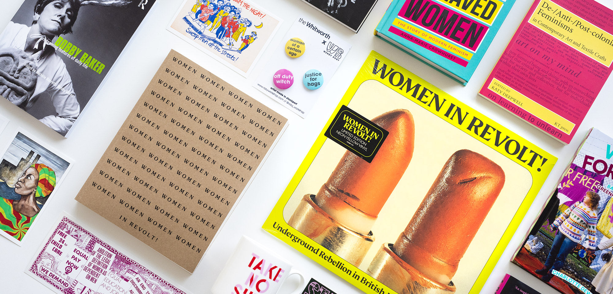 Flatly shots of lots of products from the Whitworth's Women in Revolt Collection, including books and a record.