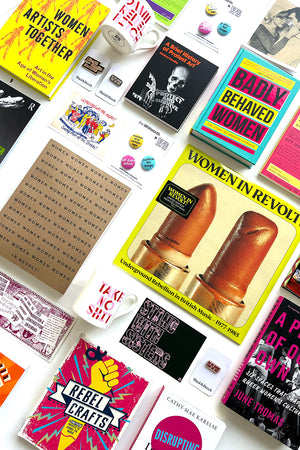 Flatly shots of lots of products from the Whitworth's Women in Revolt Collection, including books and a record.