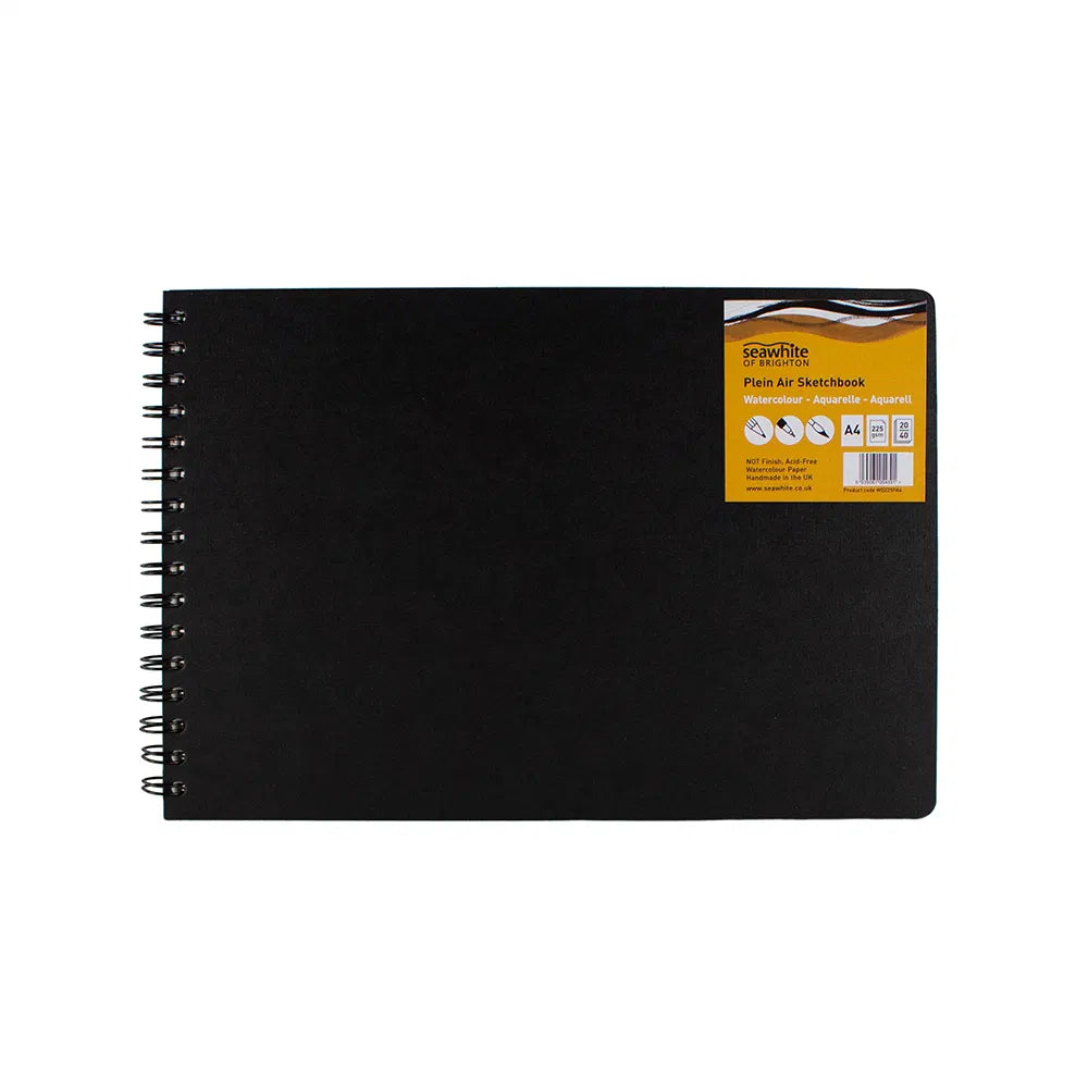 A black, spiral-bound sketchbook with a Seawhite label