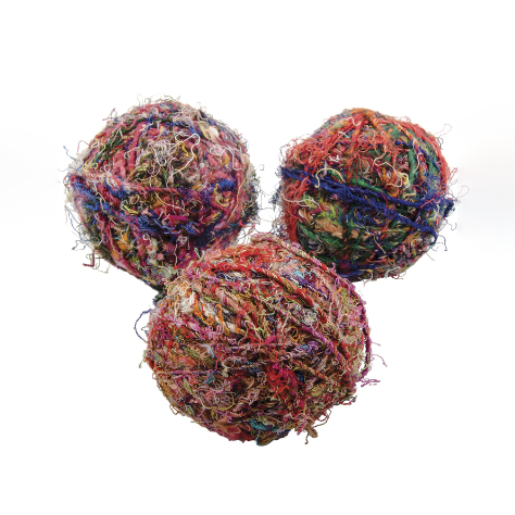 Three balls of recycled hemp wool. The wool is multi-coloured. Photographed against a white background.