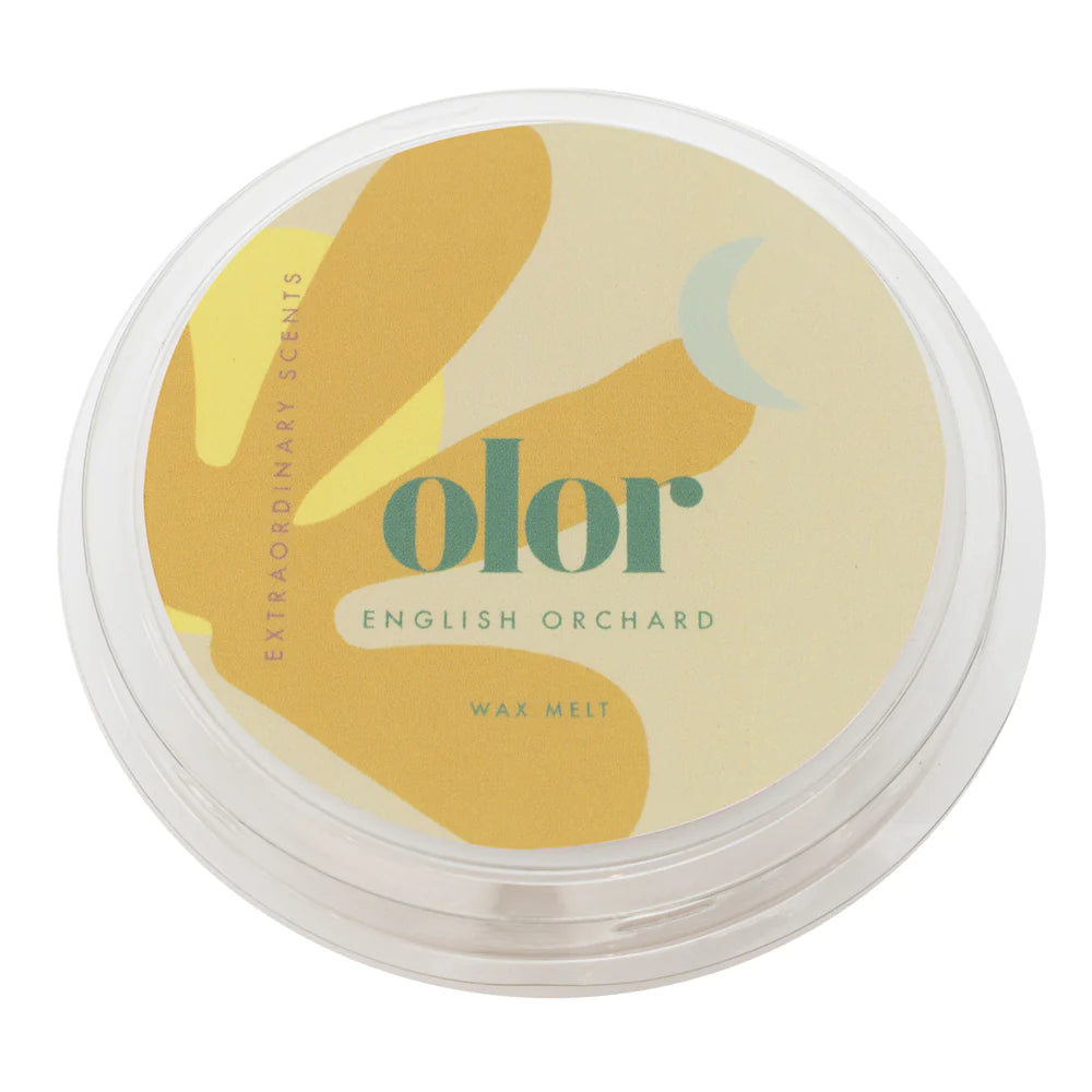 Circular packaging for wax melt with yellow branding by Olor.