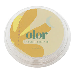 Circular packaging for wax melt with yellow branding by Olor.
