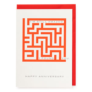 Card with red maze and red envelope. 