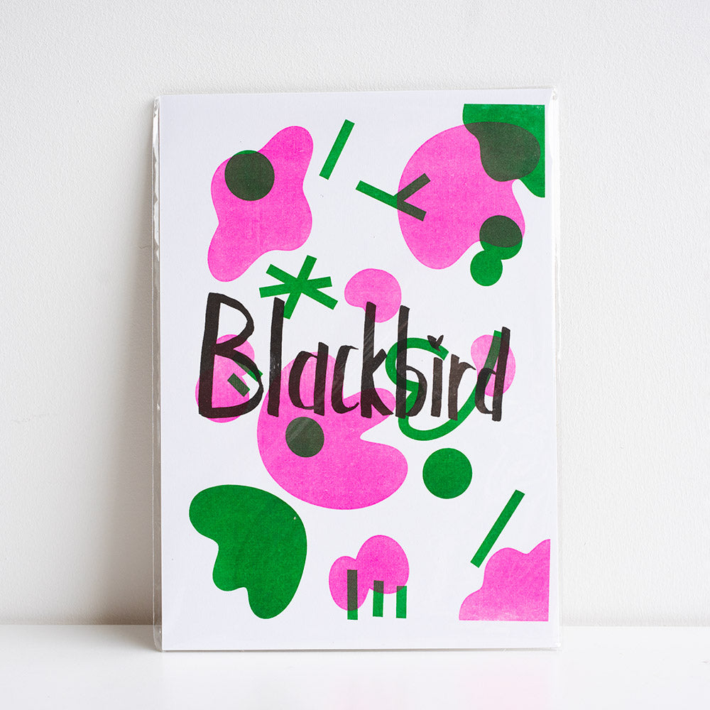 Print with abstract design and 'Blackbird' text on a white background