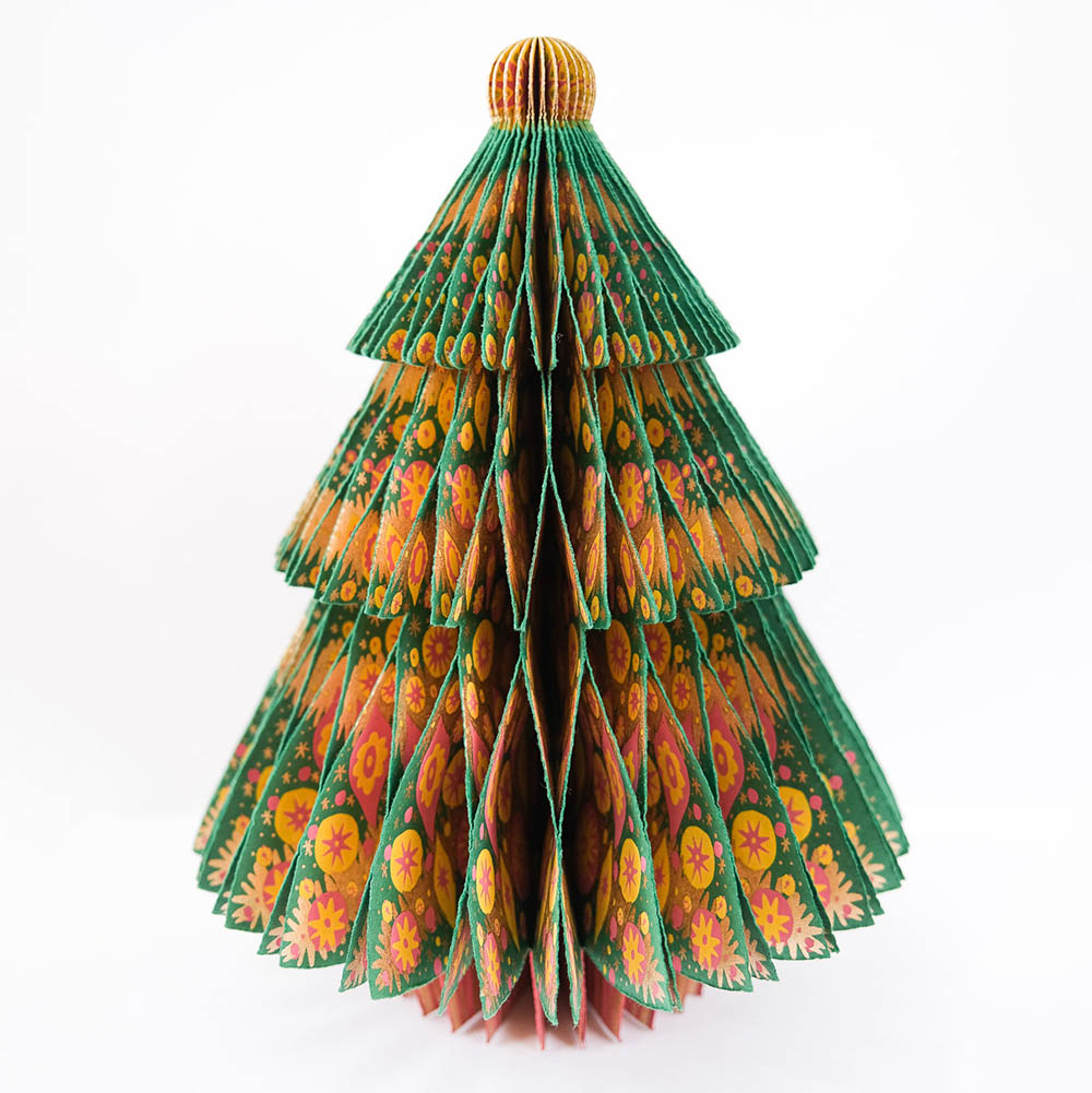 Decorative paper Christmas tree with floral pattern on a white background