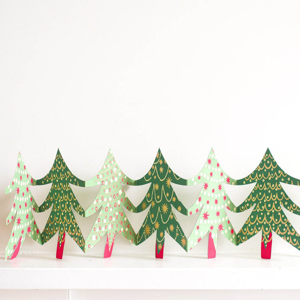 Decorative paper Christmas trees on a white background