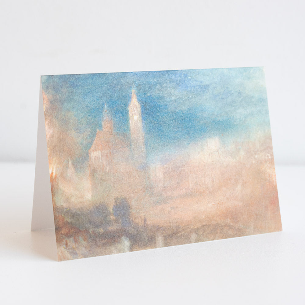 Greeting card with a scenic design of a cityscape on a white background