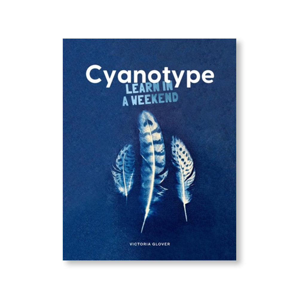 Book cover featuring cyanotype of three feathers
