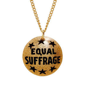 Gold necklace with 'Equal Suffrage' pendant on a white background