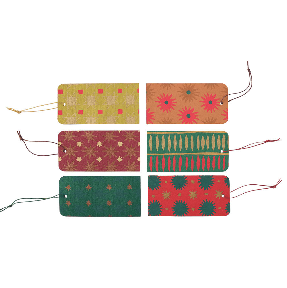 Colourful gift tags against a white background