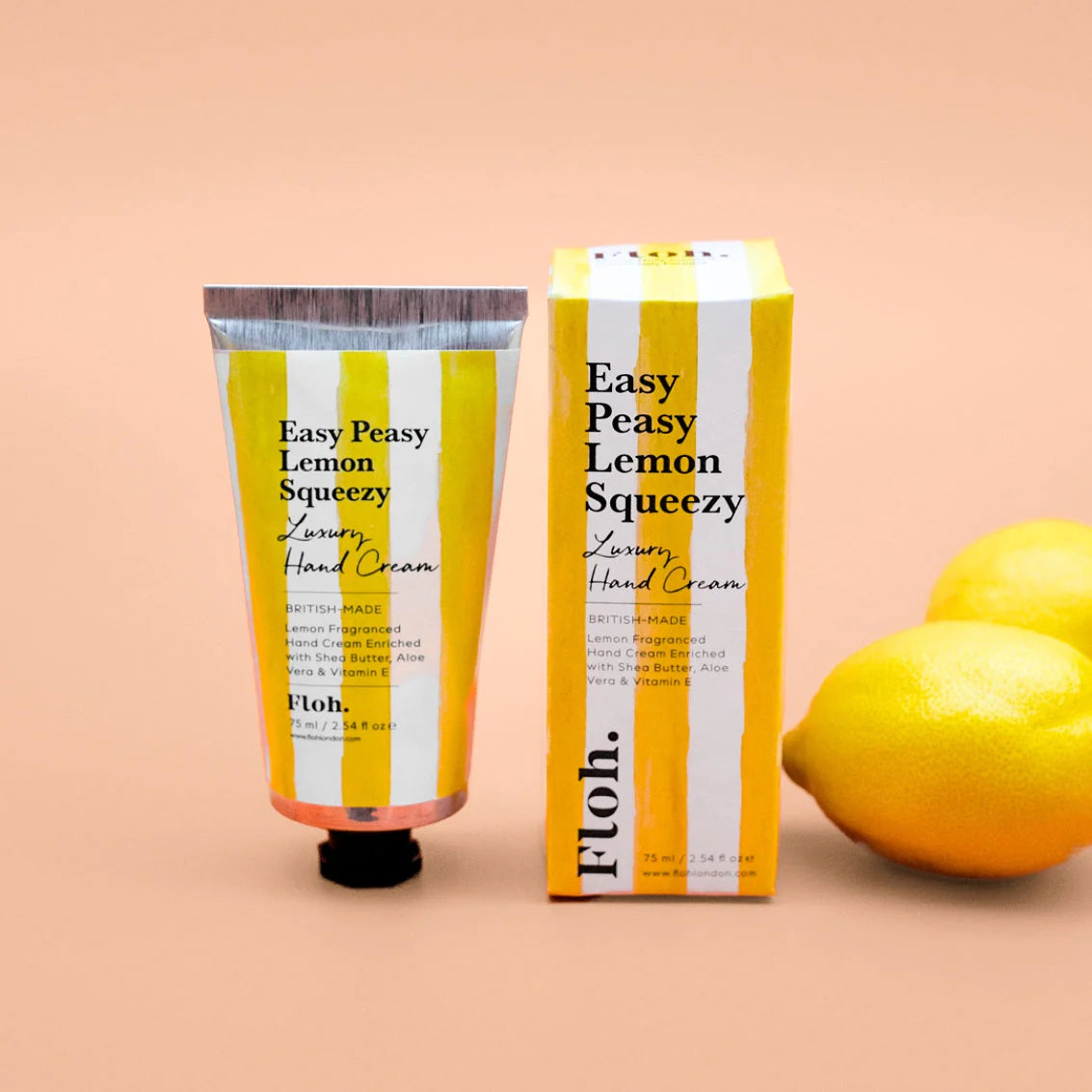 striped hand cream and its packaging against a cream backdrop
