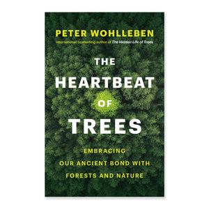 Book cover of 'The Heartbeat of Trees' by Peter Wohlleben with a forest background.