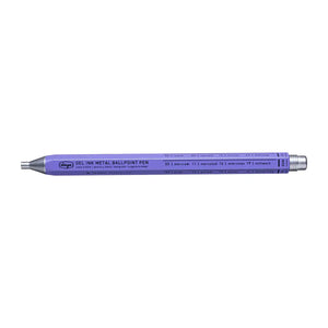 A purple metal ballpoint pen with a silver cap. The pen has multiple languages printed on it, including English, French, Spanish, Italian, and German.