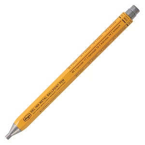 A yellow metal ballpoint pen with a silver cap. The pen has multiple languages printed on it, including English, French, Spanish, Italian, and German.