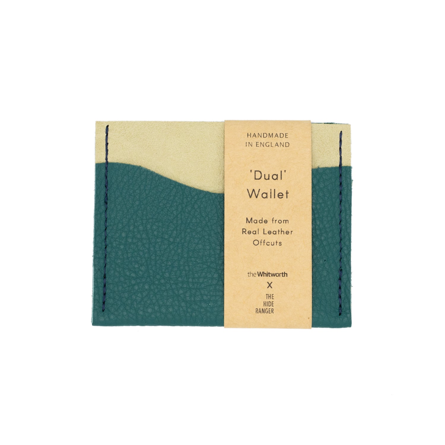 Image of green leather card wallet with label against white backdrop.