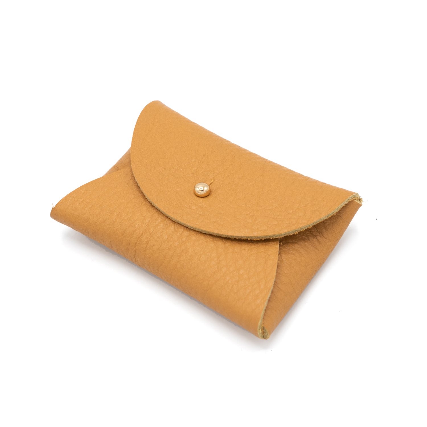 Image of a tan leather rectangular purse with a gold button against a white backdrop