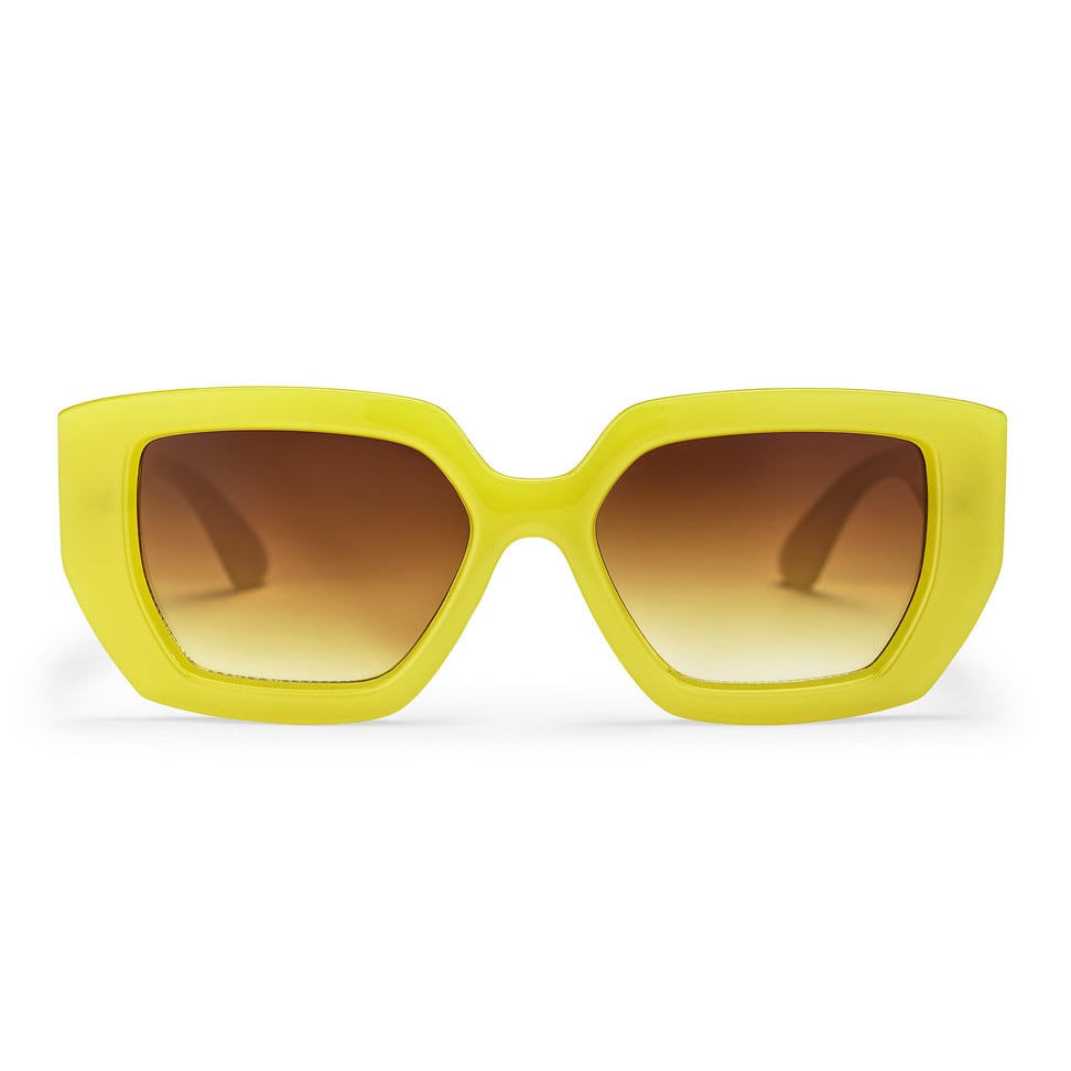 Yellow sunglasses with brown lenses on a white background