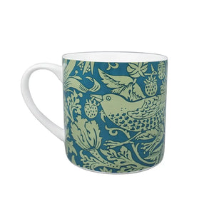 Mug with bird and leaf pattern on a white background