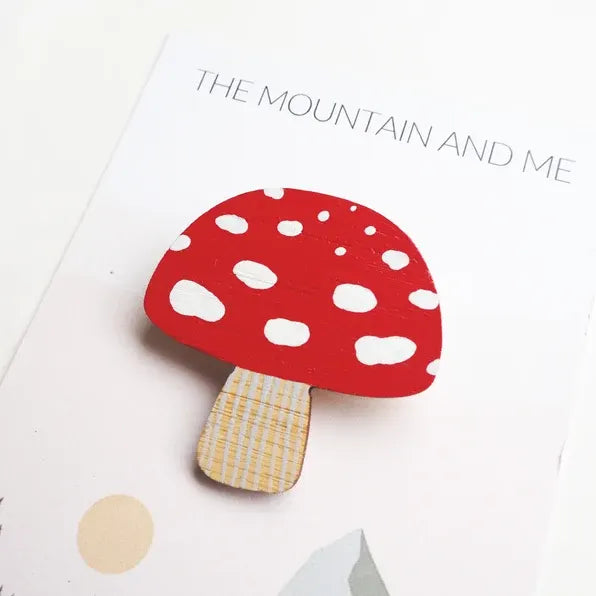 Wooden hand-painted toadstool brooch.