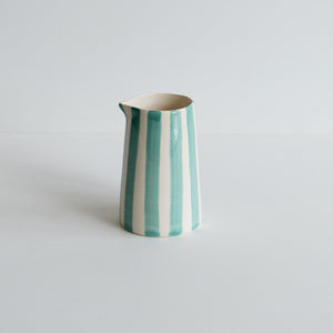 Ceramic creamer jug with a mint candy stripe painted coat