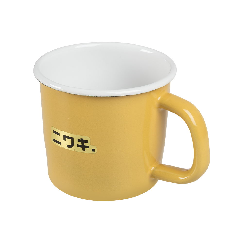 Yellow enamel mug against white background