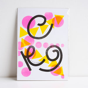Decorative print with abstract design featuring pink, yellow, and black elements on a white background.