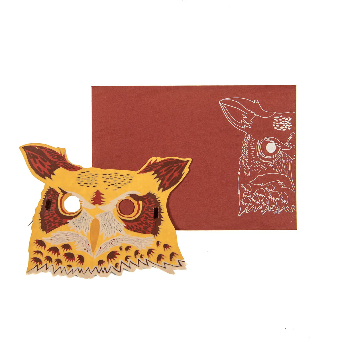 Owl shaped greetings card in front of an envelope with a illustration of an owl on it.