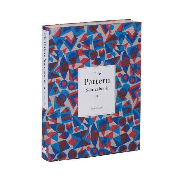 A hardback book with a colourful geometric pattern on the cover. 