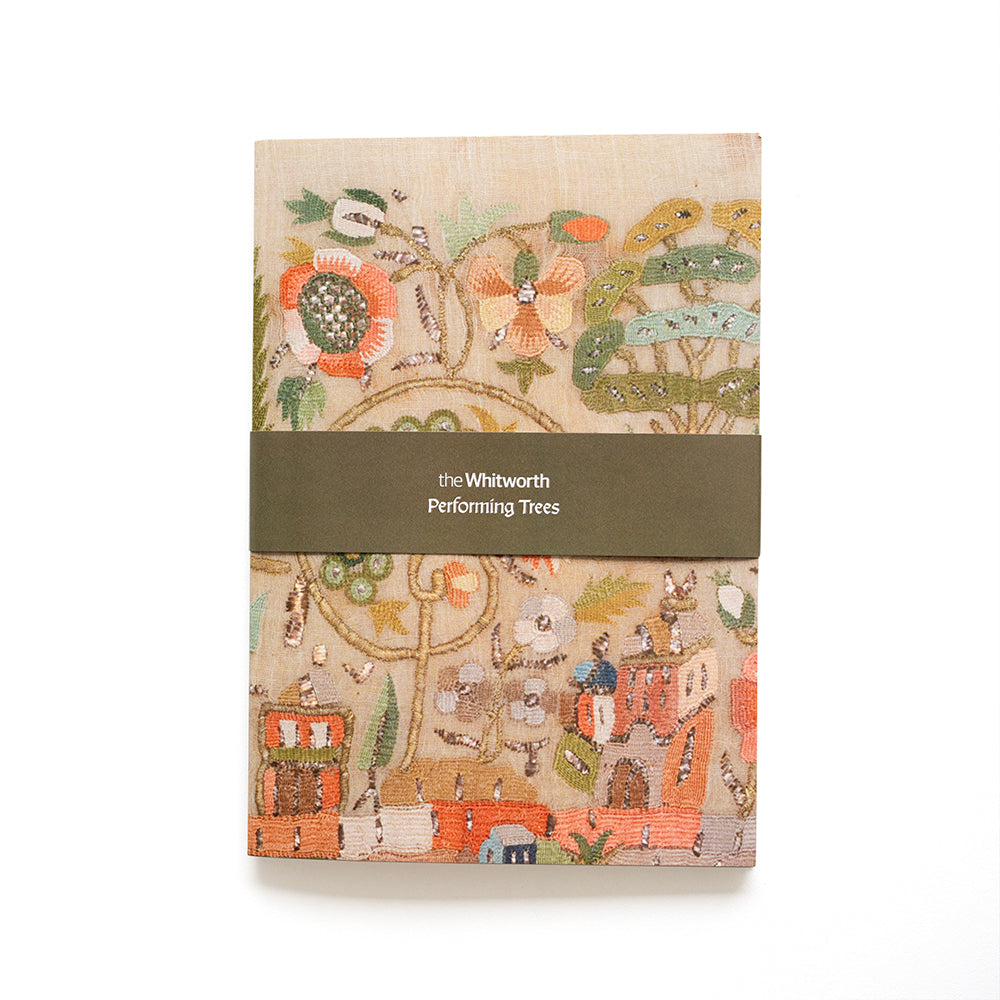 Notebook featuring an embroidered design on a white background.