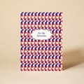 Card with the words For My Valentine at the centre. The card has a blue, red and white heart repeat pattern.