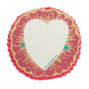 Circular greetings card with a love heart on it.