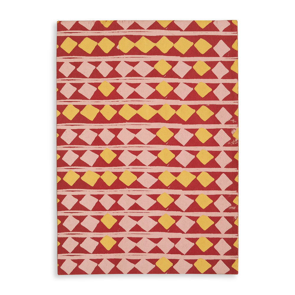 Front cover of a red scrapbook with yellow diamond pattern