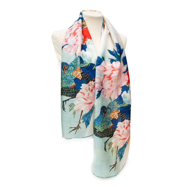 Floral and bird patterned scarf on a white background