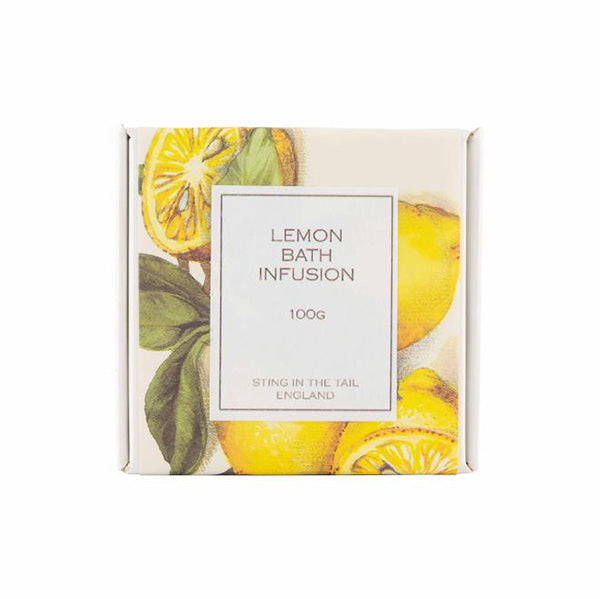Square packaging for lemon infused bath soap. Illustrations of lemons and product info.