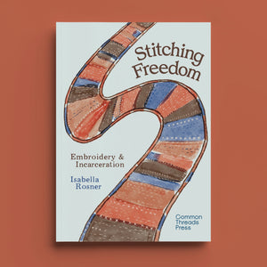 A book cover with a white background and a winding, stitched path design in various colours. 