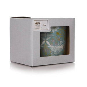 Decorative mug in a branded box on a white background