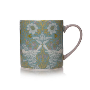 Mug featuring William Morris Stawberry Thief design against a white background.